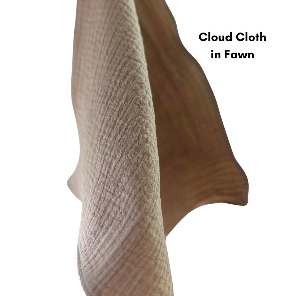 A cloud cloth in fawn (taupe) hangs. the background is pure white