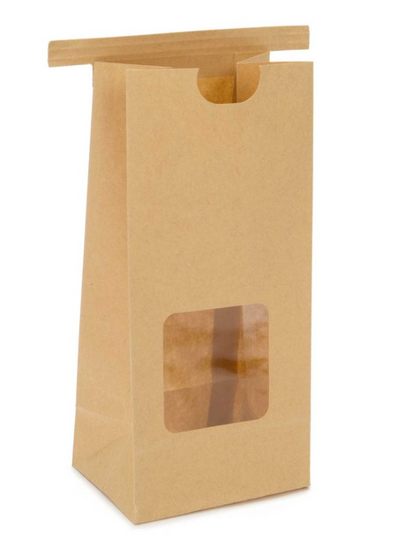 A Kraft paper coffee bag with a tin tie closure and a window in the front is offered as part of the gift set at no extra charge.