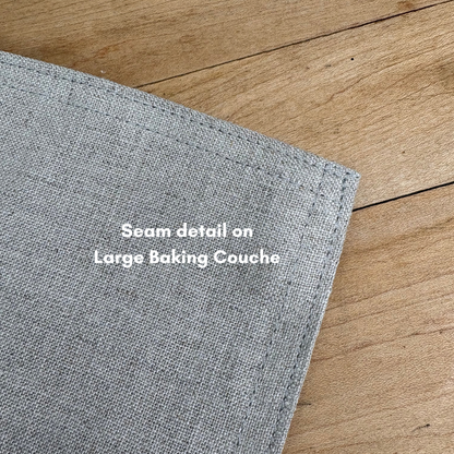 Two rows of stitching are highlighted at the corner of the large baking couche.