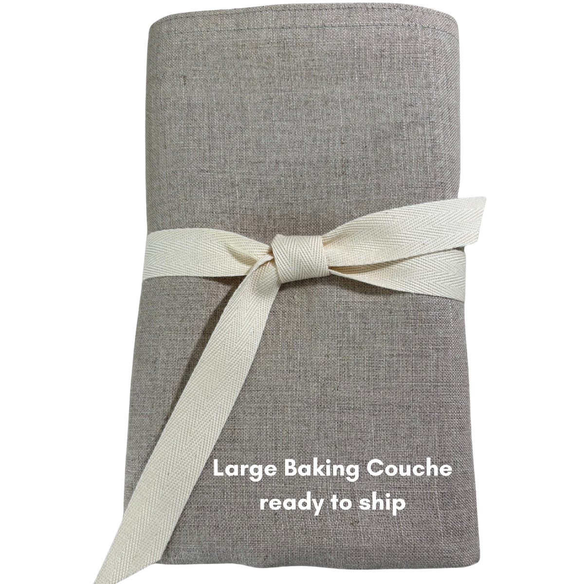 A natural coloured linen baking couche is neatly folded and tied with a natural twill ribbon.
