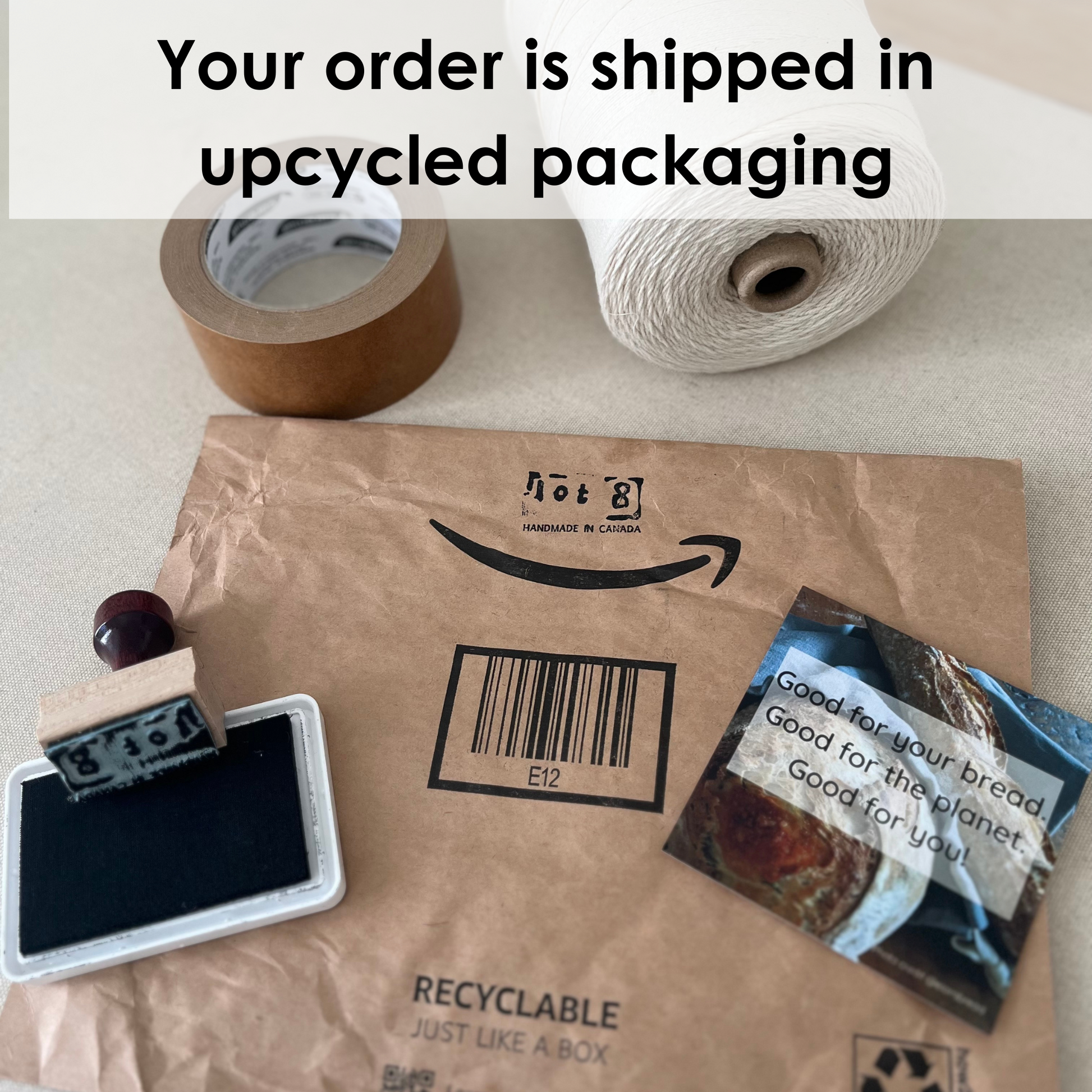 Your order is shipped in upcycled packaging. Pictured is a gently used kraft paper mailer alongside eco-friendly packing tape, cotton twine and a lot8 thank you card.