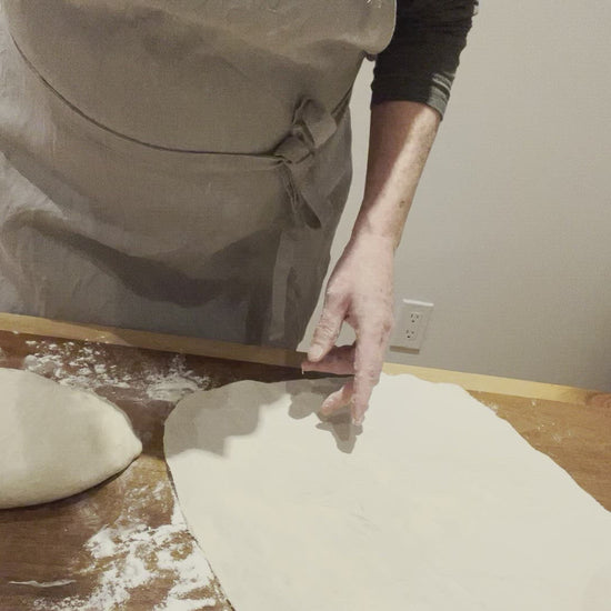 Kim is shaping dough, setting it in the bannekin then placing it into the banneton. Simple, easy to use and easier to clean than a traditional banneton liner with seams and elastic.