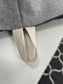 A close up of the cotton twill ribbon for hanging the all purpose sack.