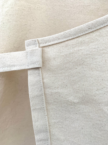 Close up detail of strap sewn into seam and reinforced