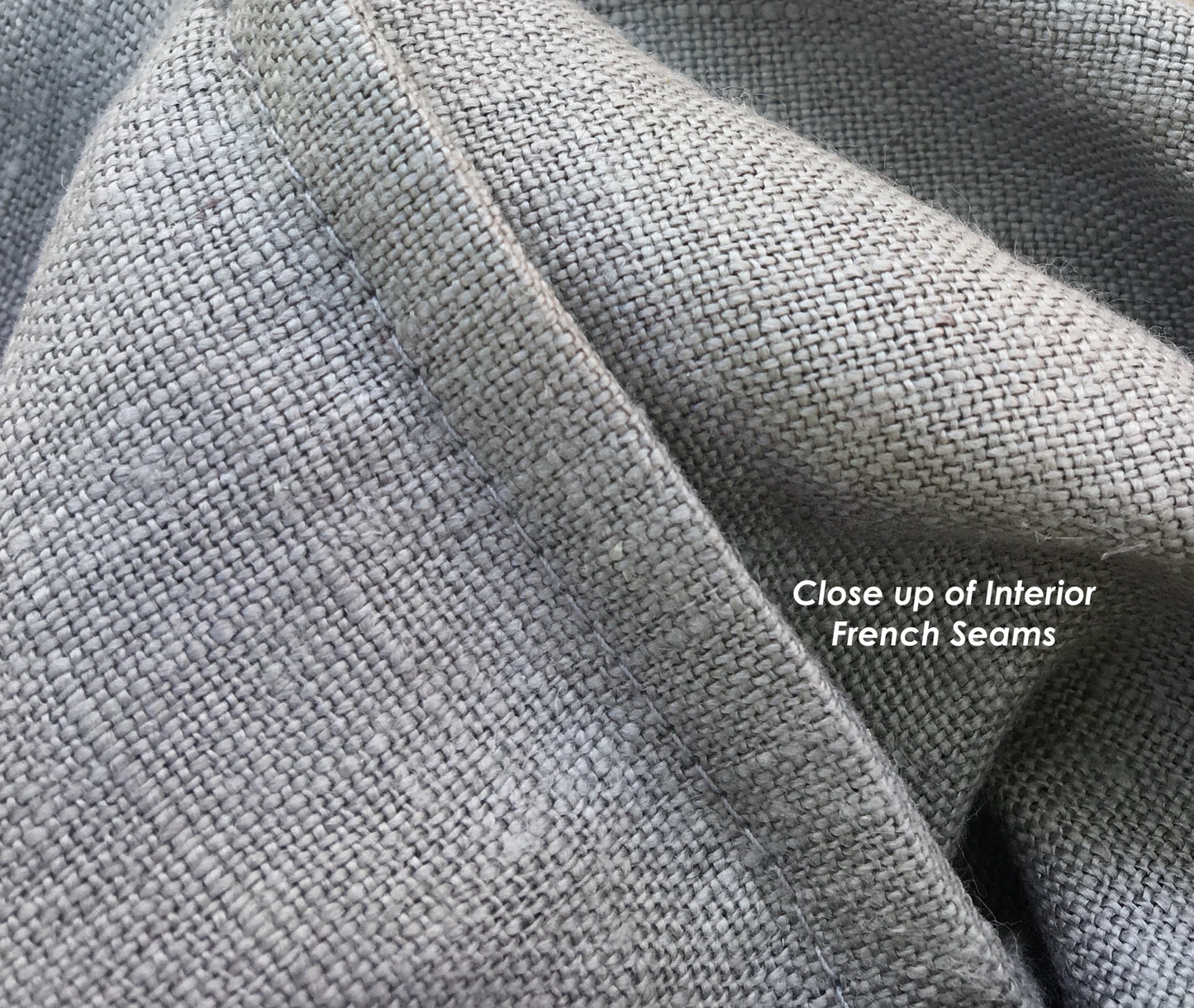 A close up detail of french seams of the hand-sewn bread bag. The raw edges of fabric are completely encased for a durable product.